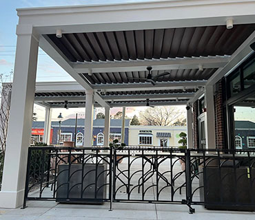 Multifamily poolside pavilion with fans