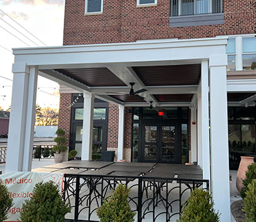 Restaurant patio cover with integrated lighting