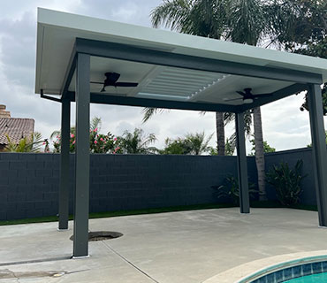Insulated patio cover over outdoor kitchen
