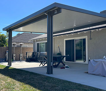 Insulated patio cover installation with various options